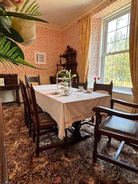 Dining room with sash window and period character